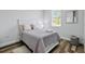 Cozy bedroom featuring a full-size bed and neutral decor at 189 Statler St, Port Charlotte, FL 33954