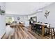 Open concept dining area with kitchen and living room views at 189 Statler St, Port Charlotte, FL 33954