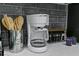 Kitchen counter with coffee maker and spice rack at 189 Statler St, Port Charlotte, FL 33954