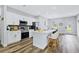 Modern kitchen with white cabinets and stainless steel appliances at 189 Statler St, Port Charlotte, FL 33954