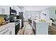 Modern kitchen with stainless steel appliances and white cabinetry at 189 Statler St, Port Charlotte, FL 33954