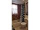 Updated bathroom with shower/tub combo and Big Ben art at 255 Capri N Cir # 17, Treasure Island, FL 33706