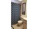 Bathroom with shower/tub combo and patterned shower curtain at 255 Capri N Cir # 17, Treasure Island, FL 33706