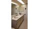 Double vanity bathroom with updated countertops and flooring at 255 Capri N Cir # 17, Treasure Island, FL 33706