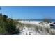 Scenic beach view with seagrass and dunes at 255 Capri N Cir # 17, Treasure Island, FL 33706