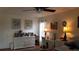 Spacious bedroom with dresser, desk, and ceiling fan at 255 Capri N Cir # 17, Treasure Island, FL 33706