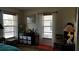 Bright bedroom with two windows and built-in storage at 255 Capri N Cir # 17, Treasure Island, FL 33706