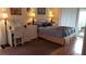 Bright bedroom with a queen-size bed, a vanity, and plenty of natural light at 255 Capri N Cir # 17, Treasure Island, FL 33706