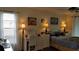 Bright bedroom with queen bed, vanity, and lots of natural light at 255 Capri N Cir # 17, Treasure Island, FL 33706