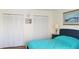Bedroom with large closet and double bed at 255 Capri N Cir # 17, Treasure Island, FL 33706