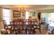 Formal dining room with large table and chandelier at 255 Capri N Cir # 17, Treasure Island, FL 33706