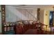 Bright dining room featuring a wood table and chairs, and a built-in cabinet at 255 Capri N Cir # 17, Treasure Island, FL 33706