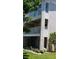 Two-story building with balconies and landscaping at 255 Capri N Cir # 17, Treasure Island, FL 33706