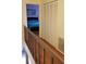 Hallway with wood floors and built-in closet at 255 Capri N Cir # 17, Treasure Island, FL 33706