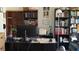 Home office features built-in shelving, a desk, and computer at 255 Capri N Cir # 17, Treasure Island, FL 33706