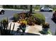 Landscaped area with various plants and flowers at 255 Capri N Cir # 17, Treasure Island, FL 33706