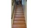 Indoor staircase with wood-look flooring at 255 Capri N Cir # 17, Treasure Island, FL 33706