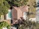 Overhead view of single-Gathering home with private pool and screened enclosure at 2712 Mock Orange Ct, Valrico, FL 33594