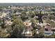 An aerial view showcasing the home's private pool and its peaceful neighborhood setting at 2712 Mock Orange Ct, Valrico, FL 33594