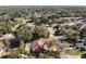 Aerial view of the home, highlighting its private pool and tranquil surroundings at 2712 Mock Orange Ct, Valrico, FL 33594