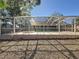Screened-in pool and spacious backyard at 2712 Mock Orange Ct, Valrico, FL 33594