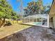 Enclosed pool with patio and fenced backyard at 2712 Mock Orange Ct, Valrico, FL 33594