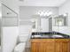 Double vanity bathroom with granite countertop and shower at 2712 Mock Orange Ct, Valrico, FL 33594