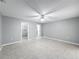 Well-lit bedroom with large closet and tile floors at 2712 Mock Orange Ct, Valrico, FL 33594