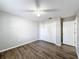 Bedroom with double closet and wood-look floors at 2712 Mock Orange Ct, Valrico, FL 33594