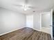 Bedroom with double closet and wood-look floors at 2712 Mock Orange Ct, Valrico, FL 33594