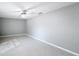 Simple bedroom with tile floors and lots of natural light at 2712 Mock Orange Ct, Valrico, FL 33594