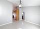 Light and airy hallway leading to other rooms at 2712 Mock Orange Ct, Valrico, FL 33594