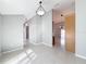 Spacious hallway with tile floors and neutral walls at 2712 Mock Orange Ct, Valrico, FL 33594