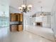 Kitchen with wood cabinets and granite countertops at 2712 Mock Orange Ct, Valrico, FL 33594