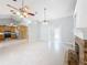 Open living area showcasing kitchen and entryway views at 2712 Mock Orange Ct, Valrico, FL 33594