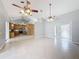 Open living area showcasing kitchen and entryway views at 2712 Mock Orange Ct, Valrico, FL 33594