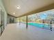 Inviting screened pool area with large patio and lush landscaping at 2712 Mock Orange Ct, Valrico, FL 33594