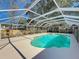 Relax in your large, screened pool and spa with fenced backyard at 2712 Mock Orange Ct, Valrico, FL 33594