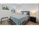 Charming bedroom with a queen-size bed and natural light at 3038 Sargeant St, Port Charlotte, FL 33948