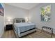 Cozy bedroom with a queen-size bed and plenty of natural light at 3038 Sargeant St, Port Charlotte, FL 33948