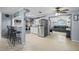 Modern kitchen with stainless steel appliances and breakfast bar at 3421 Cantrell St, Holiday, FL 34690