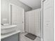 Bathroom with double sinks and shower at 3607 Trafalgar Way # 103, Palm Harbor, FL 34685