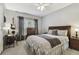 Spacious bedroom with a desk and large bed at 3607 Trafalgar Way # 103, Palm Harbor, FL 34685