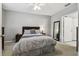 Bright bedroom with double bed and carpet at 3607 Trafalgar Way # 103, Palm Harbor, FL 34685