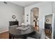 Round table dining area with kitchen view at 3607 Trafalgar Way # 103, Palm Harbor, FL 34685