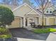 Townhouse with attached garage and welcoming front porch at 3607 Trafalgar Way # 103, Palm Harbor, FL 34685
