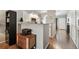 Modern kitchen with white cabinets, stainless steel appliances, and a breakfast bar at 3607 Trafalgar Way # 103, Palm Harbor, FL 34685