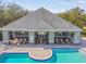 Community pool and cabana from above at 3607 Trafalgar Way # 103, Palm Harbor, FL 34685