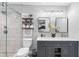 Elegant bathroom with double vanity and a walk-in shower at 3756 E Lake Dr, Land O Lakes, FL 34639