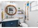 Nautical-themed bathroom with shiplap walls at 3756 E Lake Dr, Land O Lakes, FL 34639